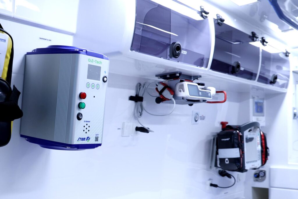 Ozone sanitation device wall-mounted next to storage cabinets